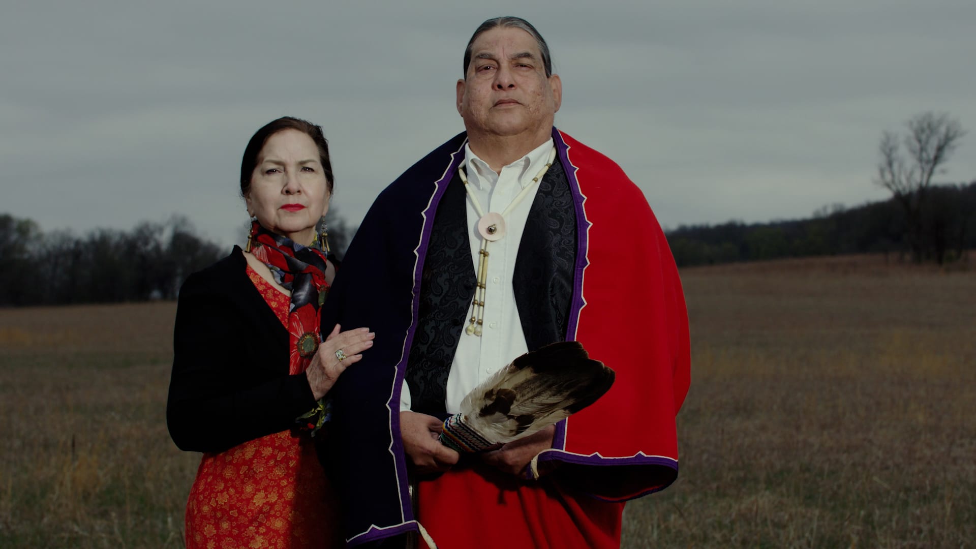 Everett Waller and Marian on the Osage prairie in traditional regalia.