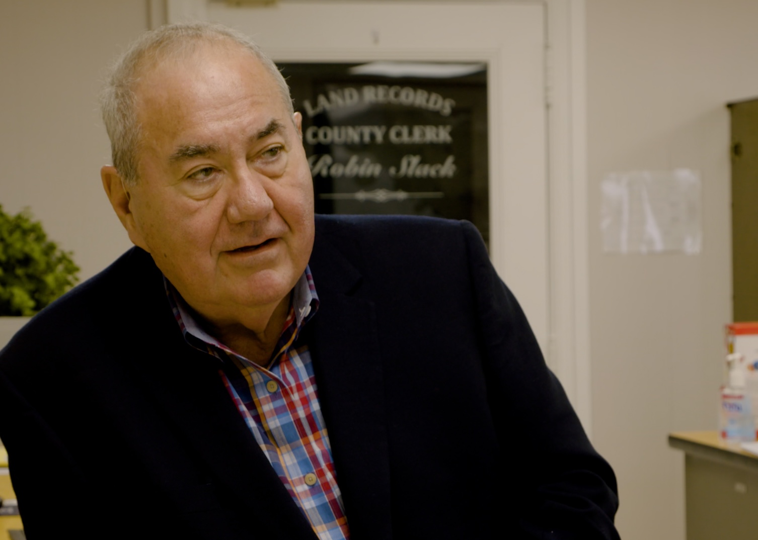 A subject interviewed at the Land Records County Clerk office.